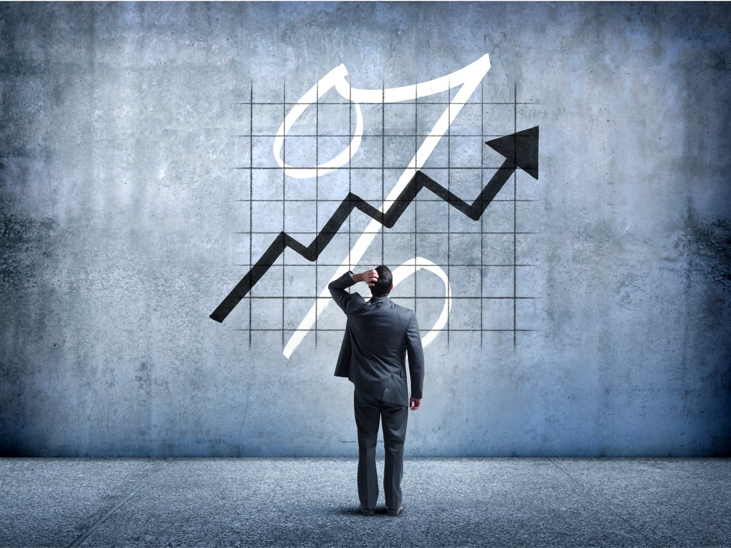 man looking at confusing graph - representing utility rates