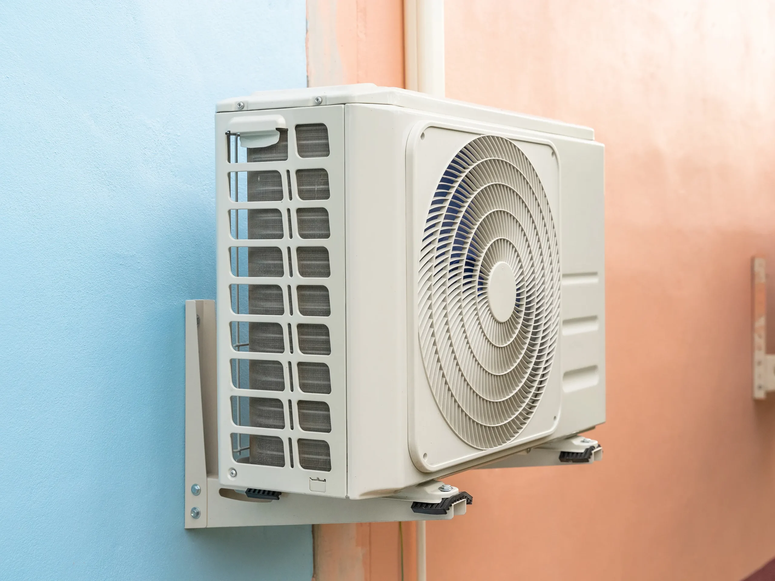 mini split heat pump mounted on a wall