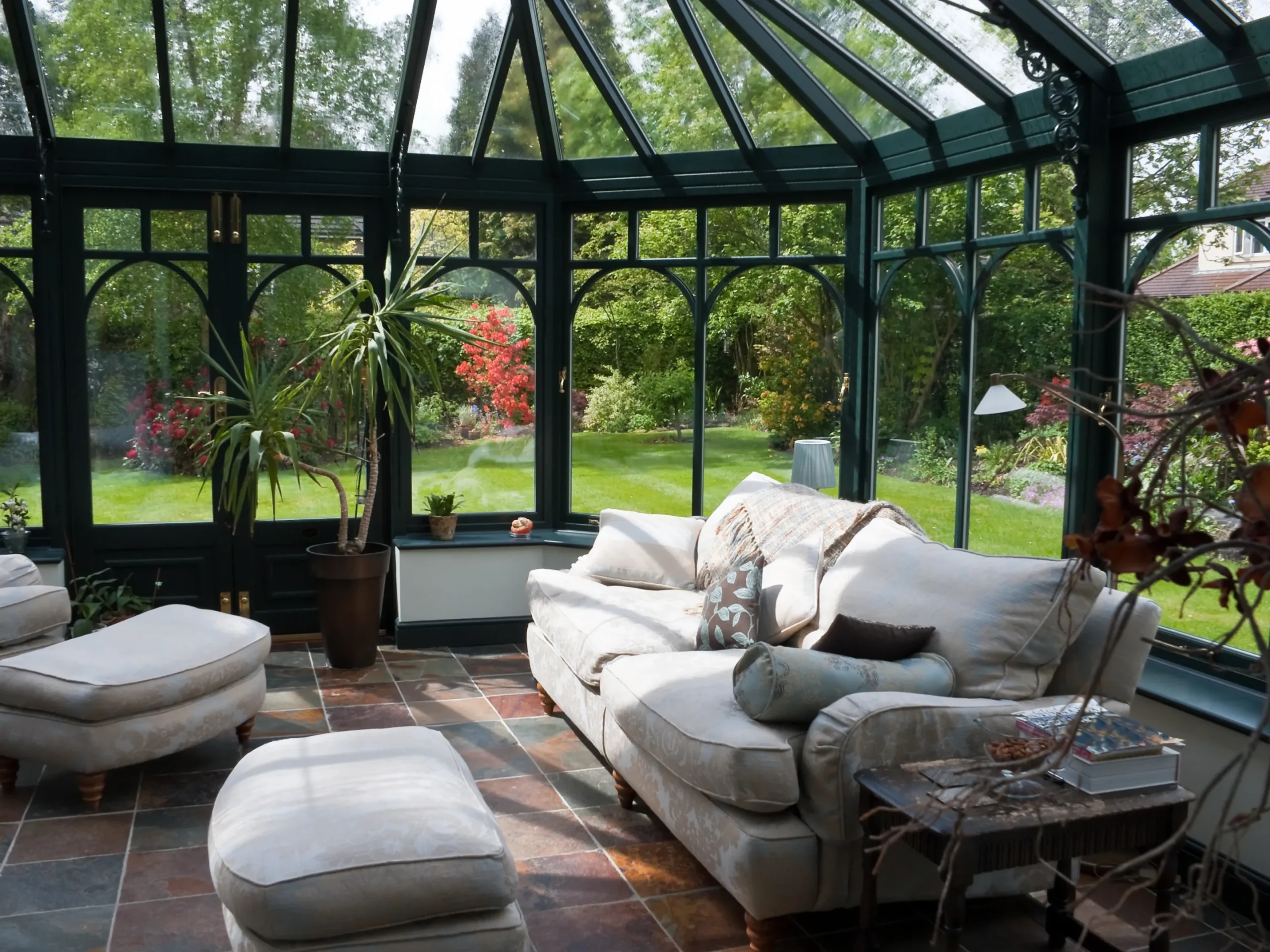 Shaded sunroom with metal siding